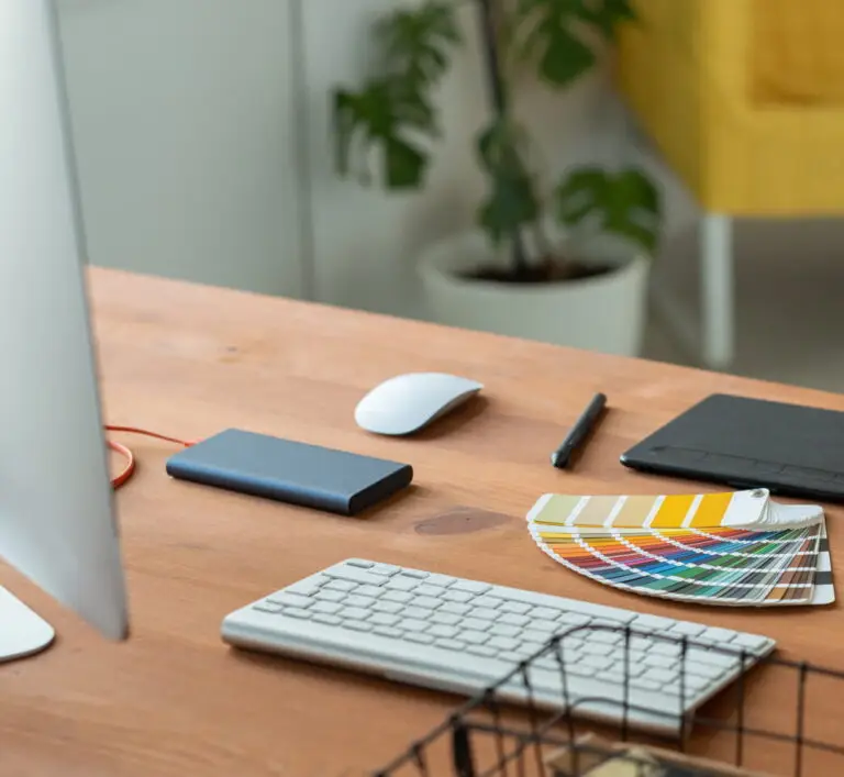Katagraphics graphic design services. Image of Kats desk.